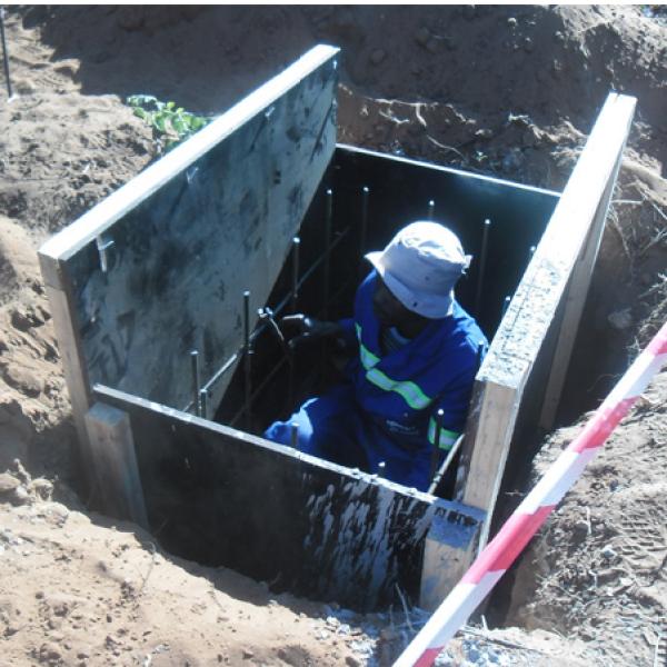Francistown Installing fiber cable